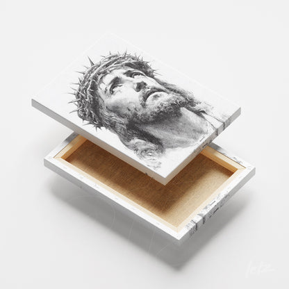 canvas print featuring a black and white portrait of Christ crowned with thorns on a white background
