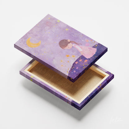 decorative box designed as a frame featuring an illustration of a girl in a pink dress against a purple background with stars and a moon
