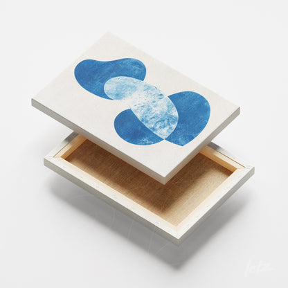 canvas print featuring abstract art in shades of blue on a light background