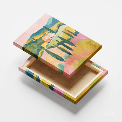canvas artwork featuring a colorful landscape of hills and cypress trees in artistic frame