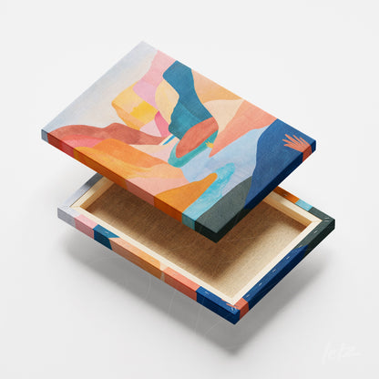 canvas print featuring abstract art in warm and cool tones with a colorful frame