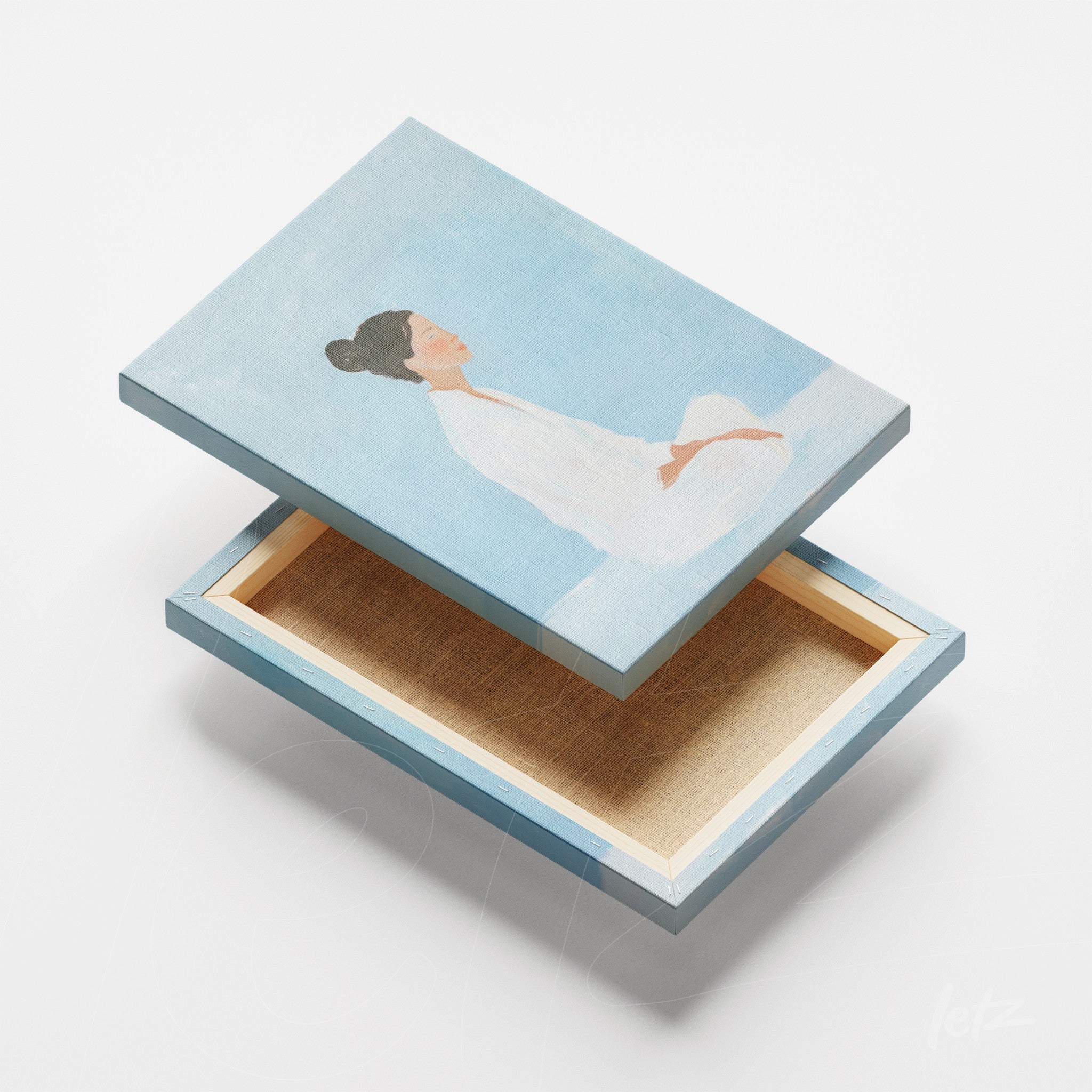 canvas art featuring a serene woman in meditation with a soft blue background and light frame