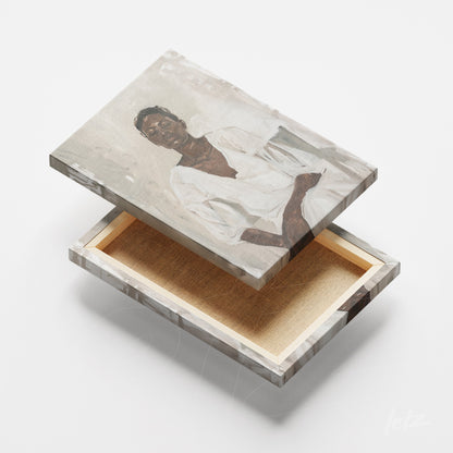 canvas wall art featuring a seated woman portrait in neutral tones, supported by a clear frame with a nude background