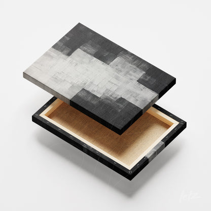 framed artwork with a black and white grid pattern featuring a modern texture