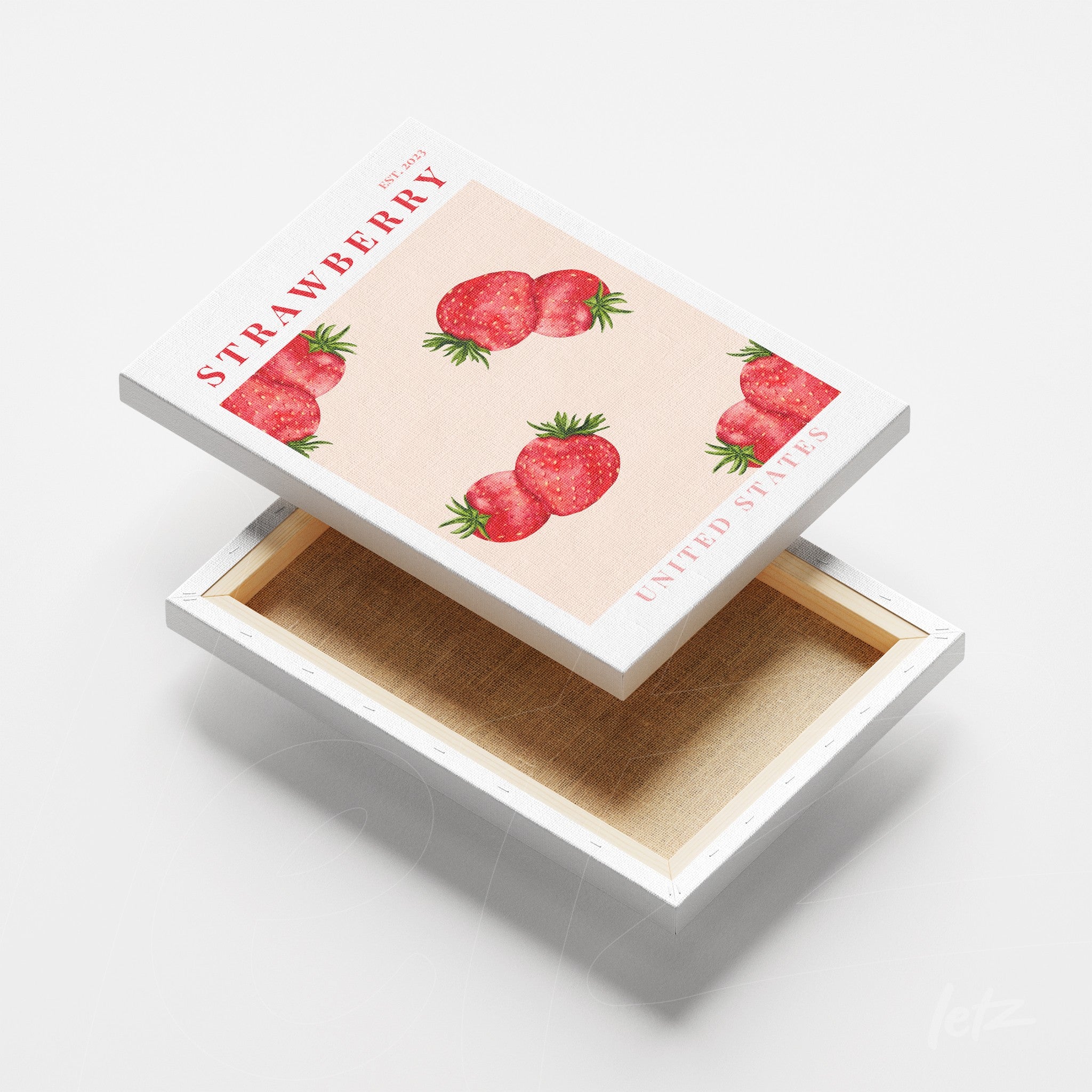 framed art featuring strawberries on a pink background with a white textured frame