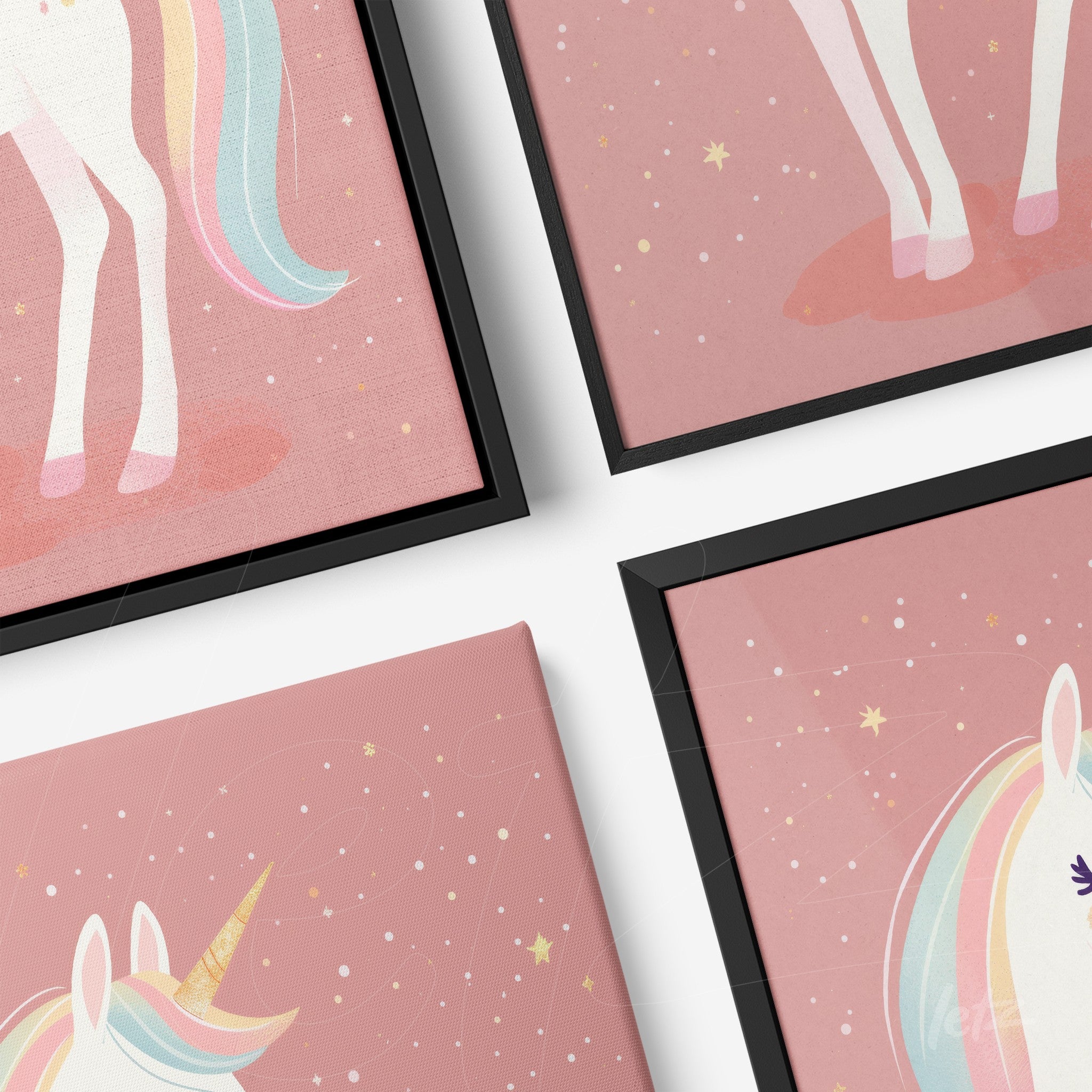 collection of canvas prints featuring unicorn illustrations on light pink background with stars, highlighted by black frames