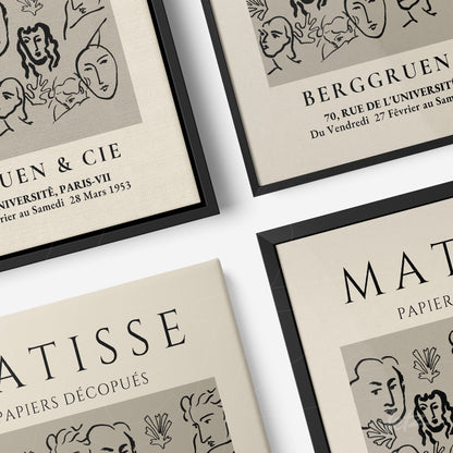 collection of framed wall art featuring minimalist line drawings of stylized faces on a beige background