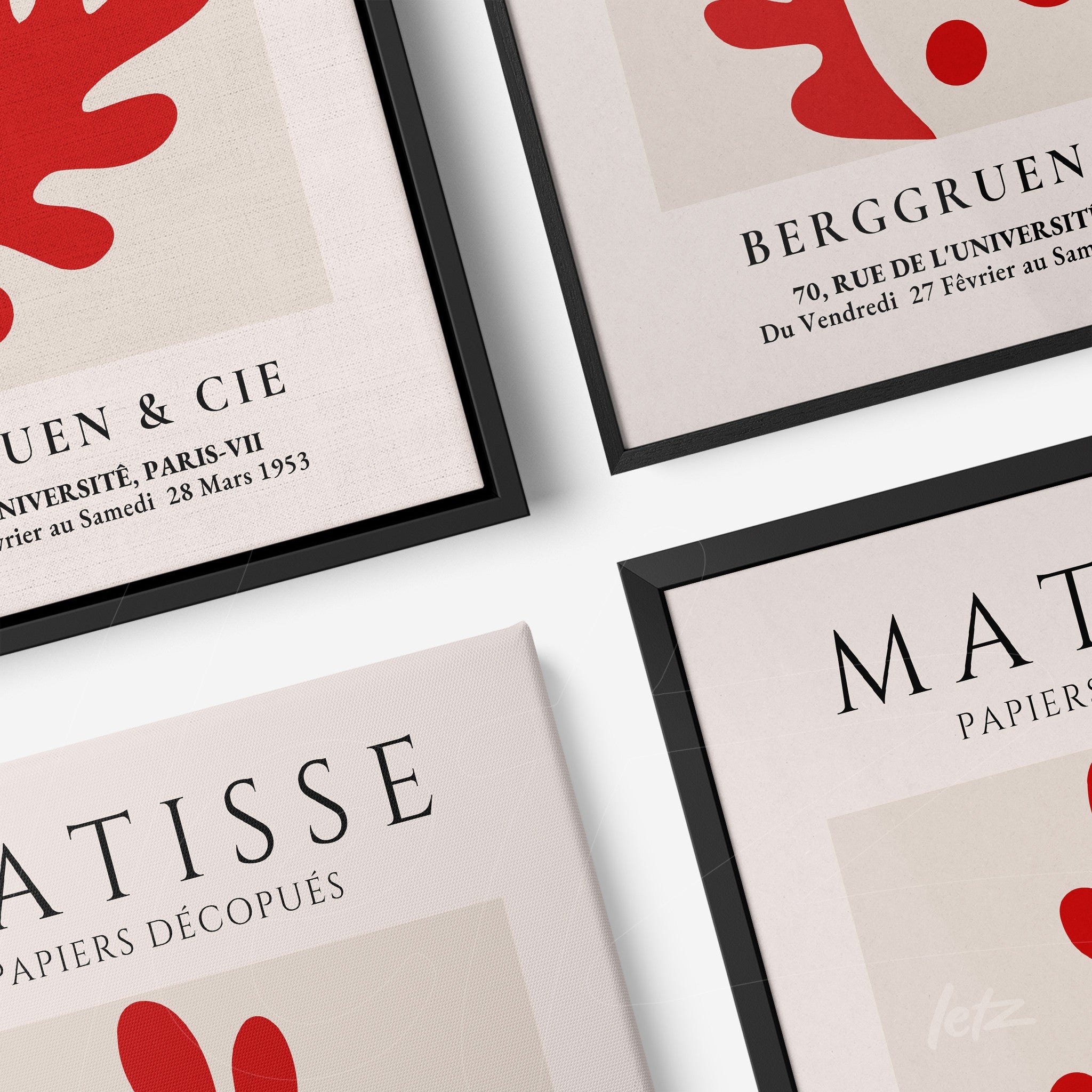 collection of four framed artworks featuring abstract red leaf designs and stylized French typography