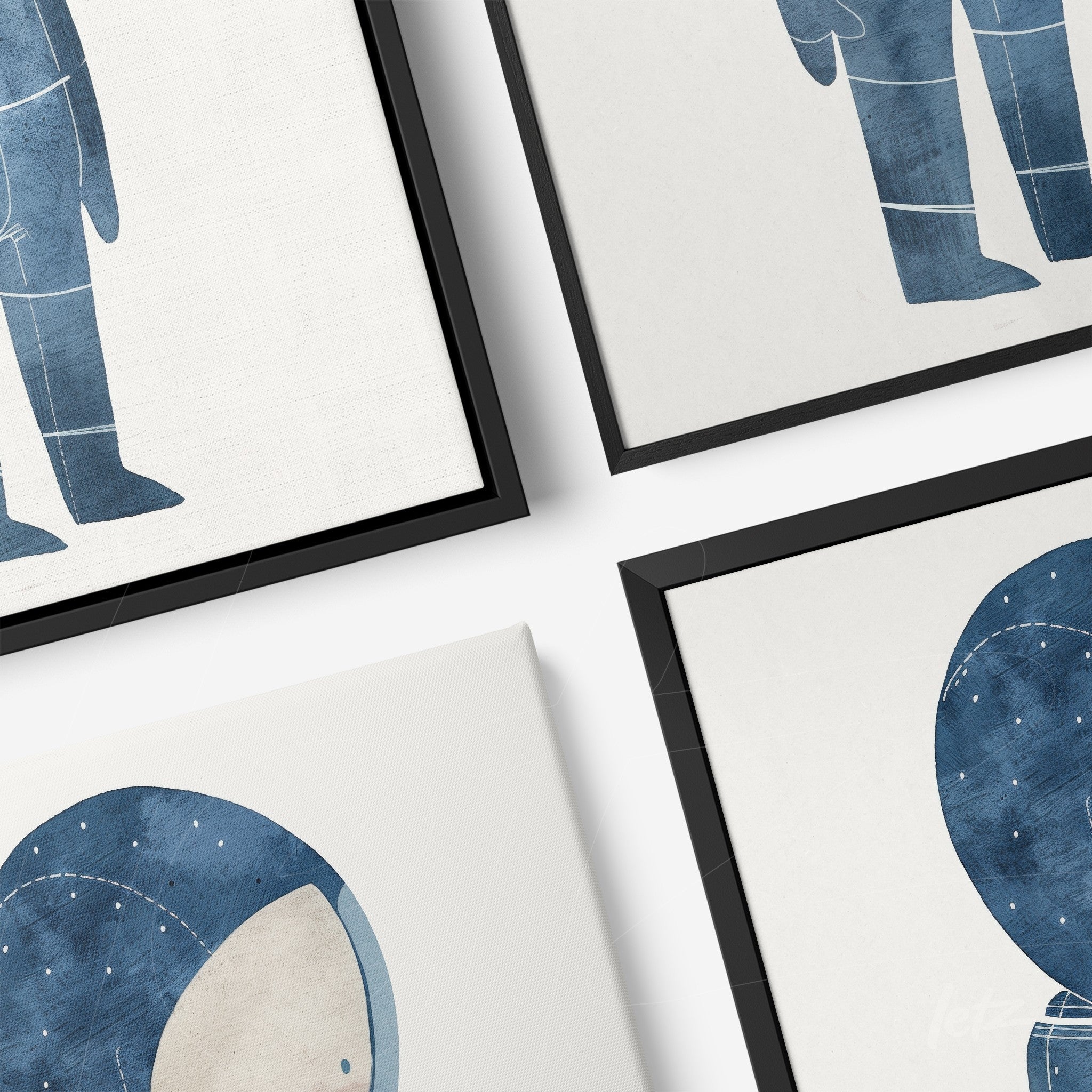set of framed artworks featuring blue and white astronaut illustrations with black frames