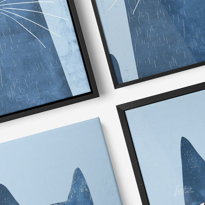 composition of wall art featuring abstract cat illustrations in shades of blue with black frames