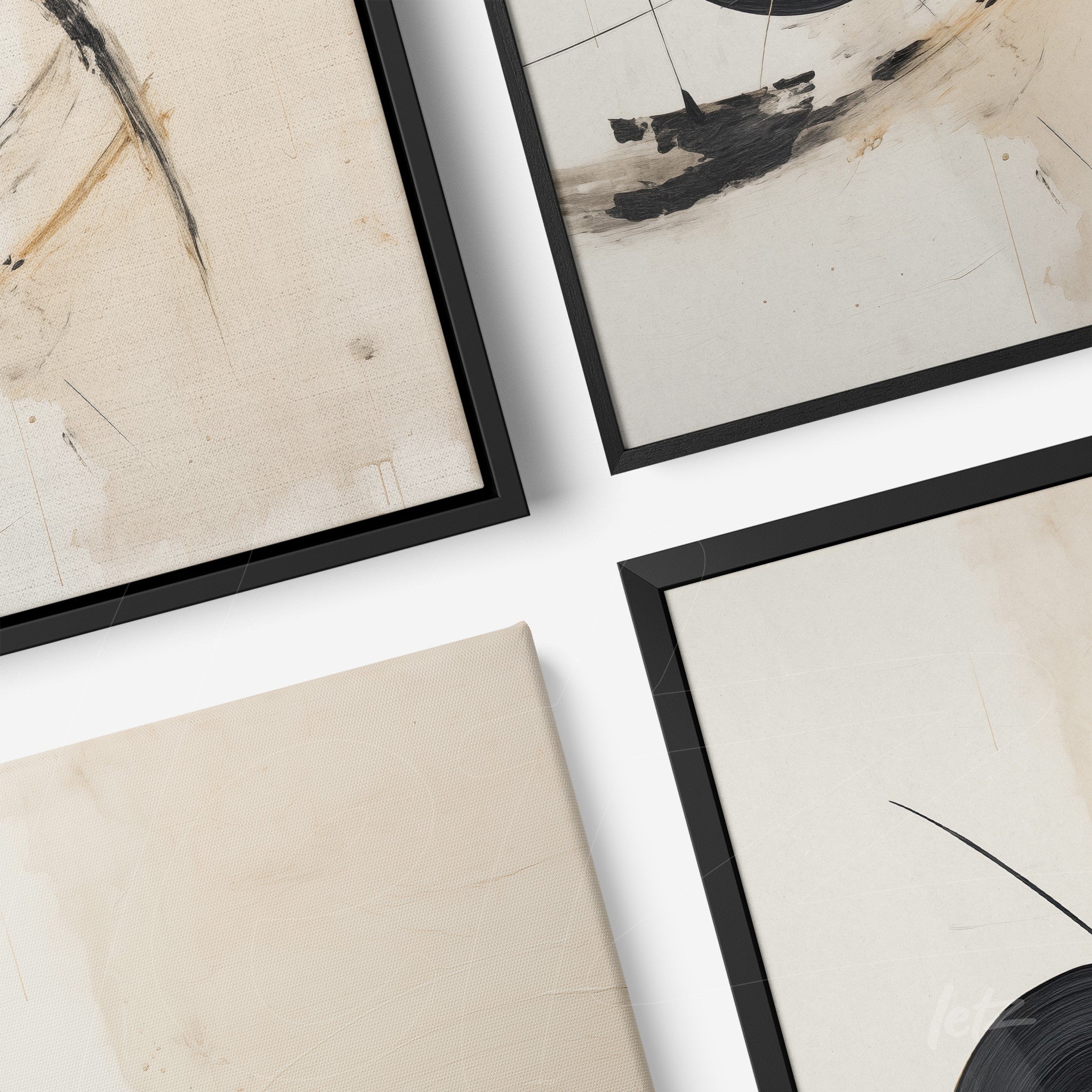 collection of framed abstract art in neutral tones with black frames