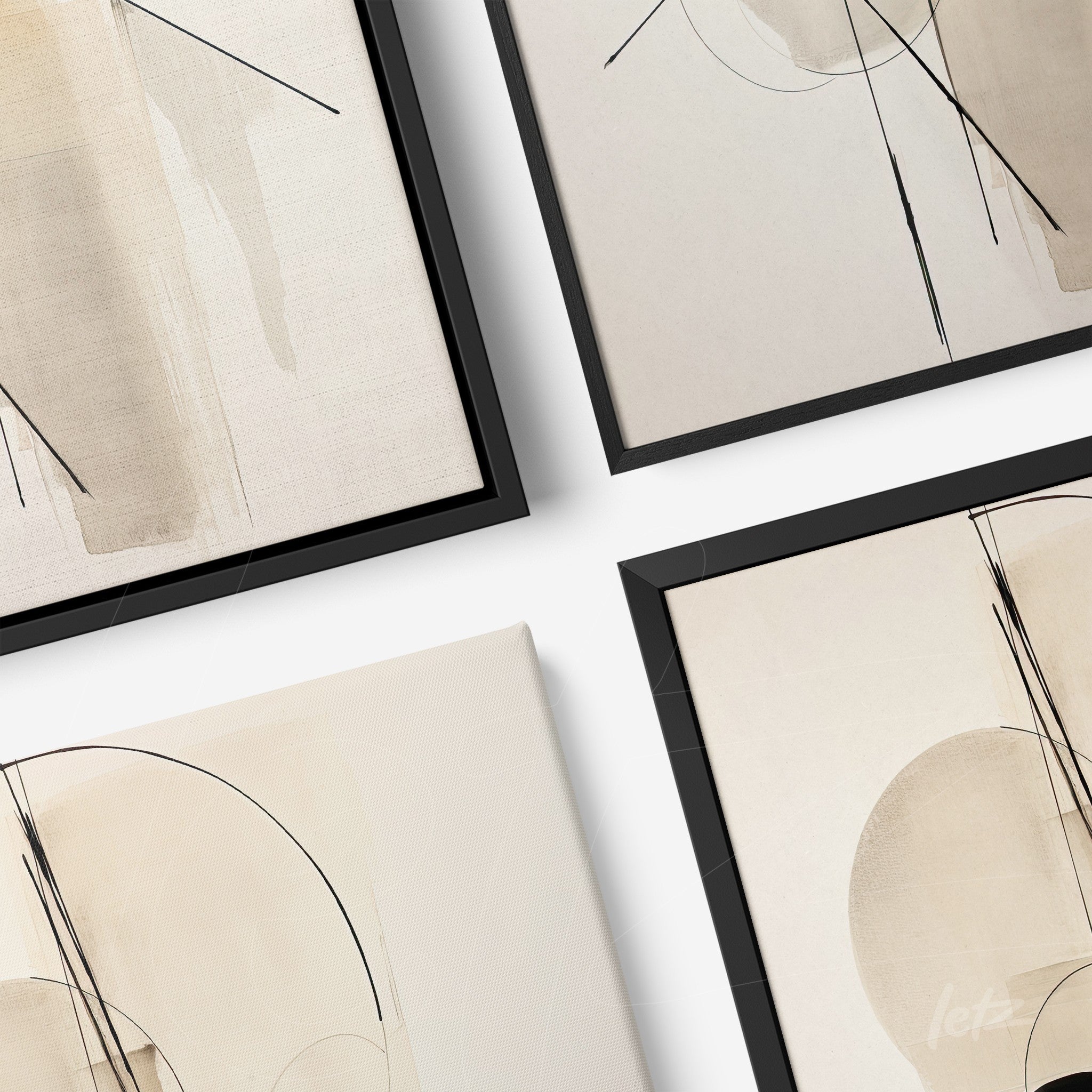 composition of decorative art pieces featuring abstract designs on light backgrounds with black lines and geometric shapes, framed in sleek black frames