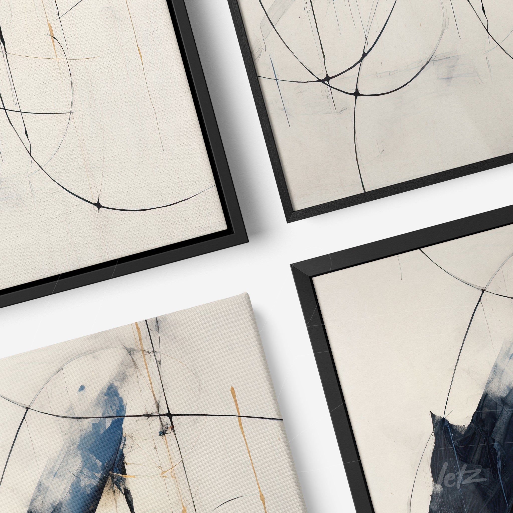 composition of four abstract framed artworks featuring blue and black brush strokes on light background
