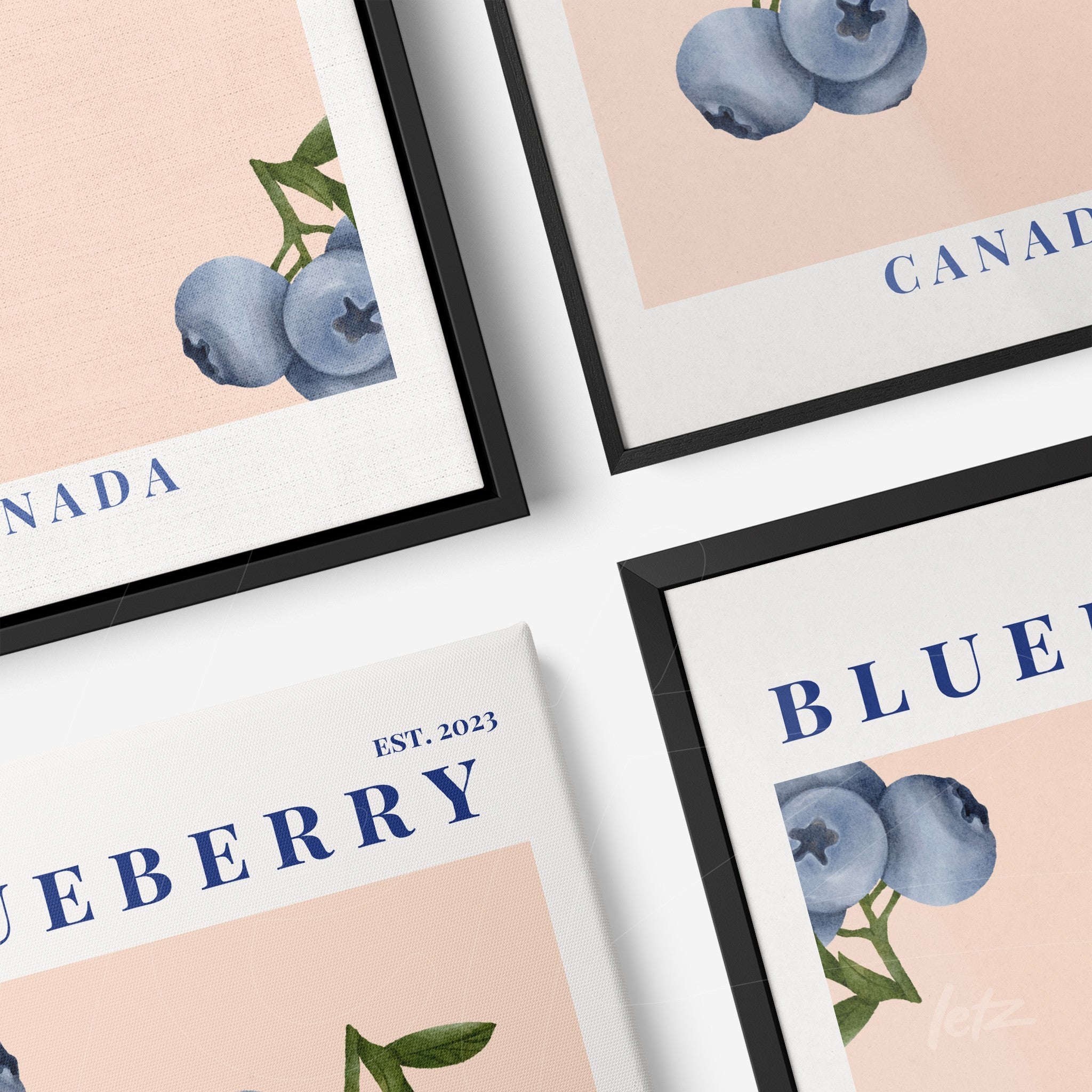 collection of framed wall art featuring blueberry illustrations on soft pink backgrounds with black and white frames