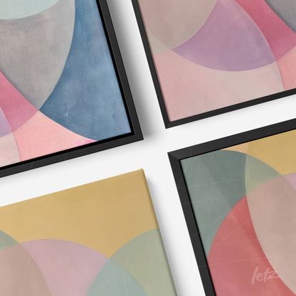 collection of decorative wall art featuring abstract designs in pastel shades, framed in thin black frames and yellow canvas