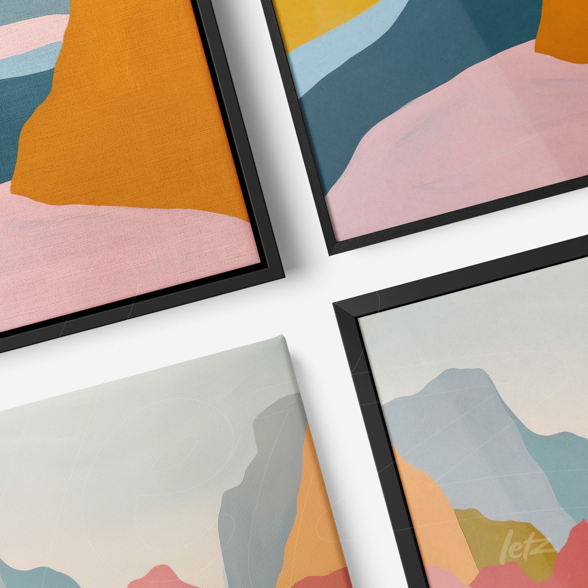 collection of framed abstract art in pastel colors with black frames