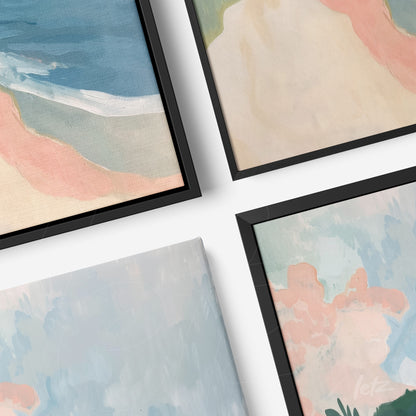 composition of framed wall art featuring abstract landscapes in soft pastel colors