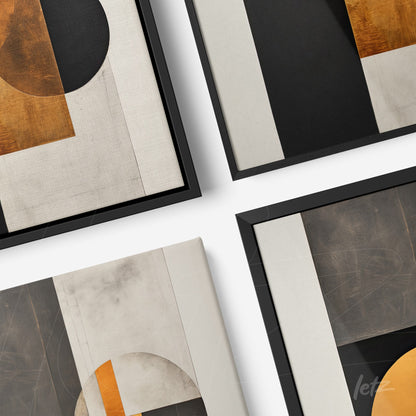 set of geometric wall art pieces featuring orange, black, and gray elements in sleek black frames