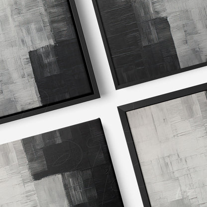 collection of abstract wall art in shades of black and gray with sleek black frames