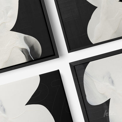 collection of canvas art featuring abstract designs in black background with white elements, black frame
