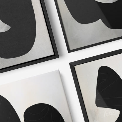 composition of abstract wall art in black and white, featuring thin black frames on a light background