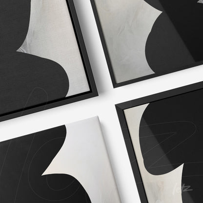 composition of framed canvas artwork featuring abstract black and white shapes with thin black frames from various angles