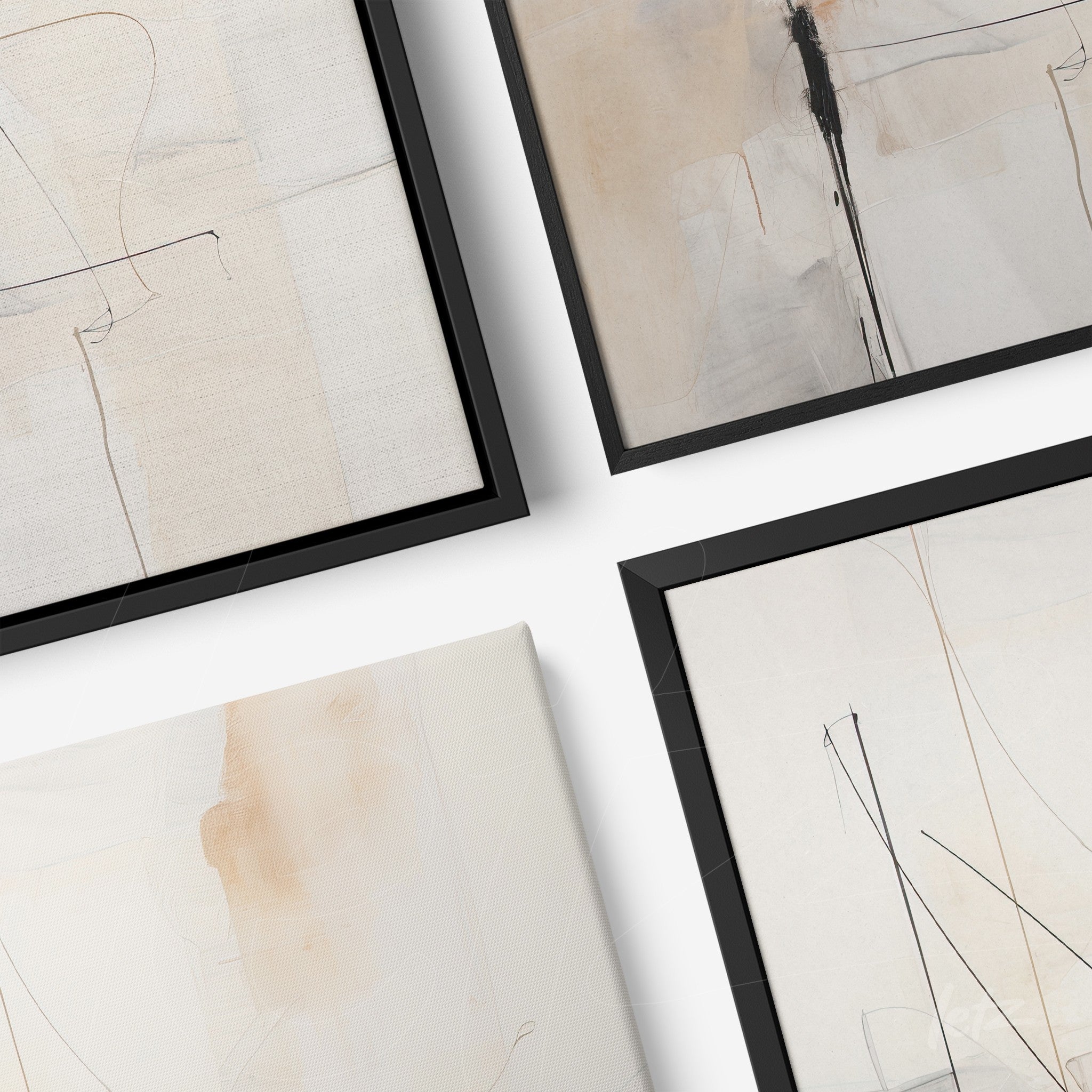collection of framed abstract art pieces in neutral tones with black frames