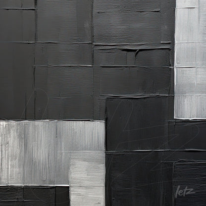 abstract wall art in black and gray tones featuring distinct textures and geometric shapes