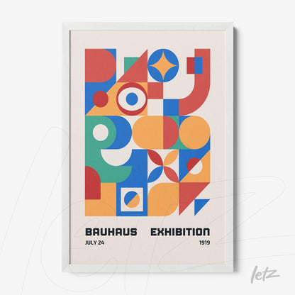 framed wall art with colorful geometric design featuring abstract shapes in blue, red, and orange in a white frame