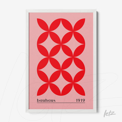 poster print with red geometric pattern on pink background and white frame