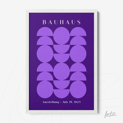 poster print with geometric design in purple featuring text 'bauhaus' and 'ausstellung - july 19, 1923' in a white frame