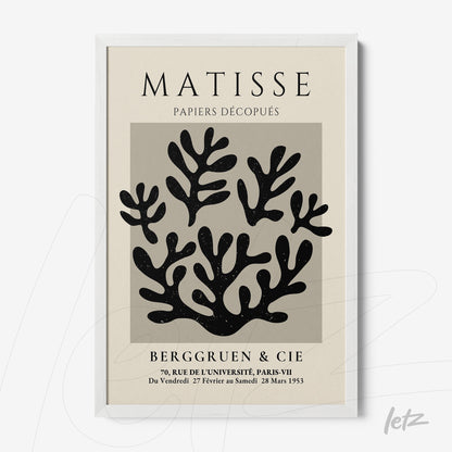 framed wall art featuring black and white cut-out design inspired by Matisse with white frame