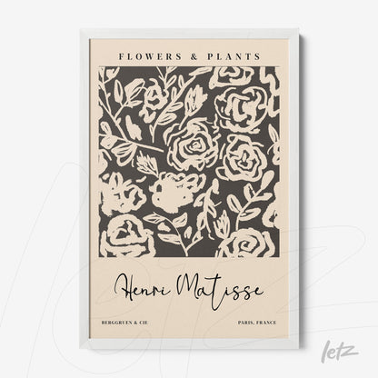 framed wall art featuring modern floral design with beige background and white frame