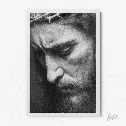 framed artwork featuring a black and white portrait of a male figure with a sorrowful expression