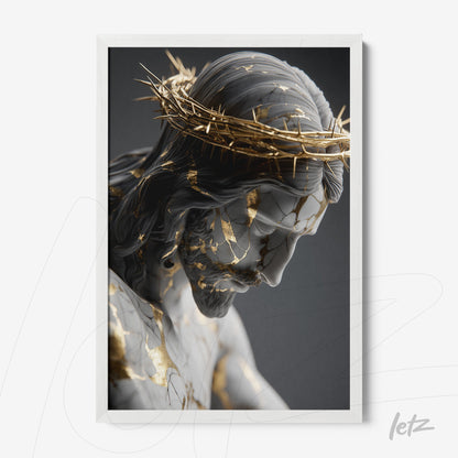 framed artwork featuring a sculpture of crucified Christ with gold leaf details and white frame