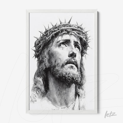 framed wall art in white featuring a black and white portrait of Jesus Christ wearing a crown of thorns