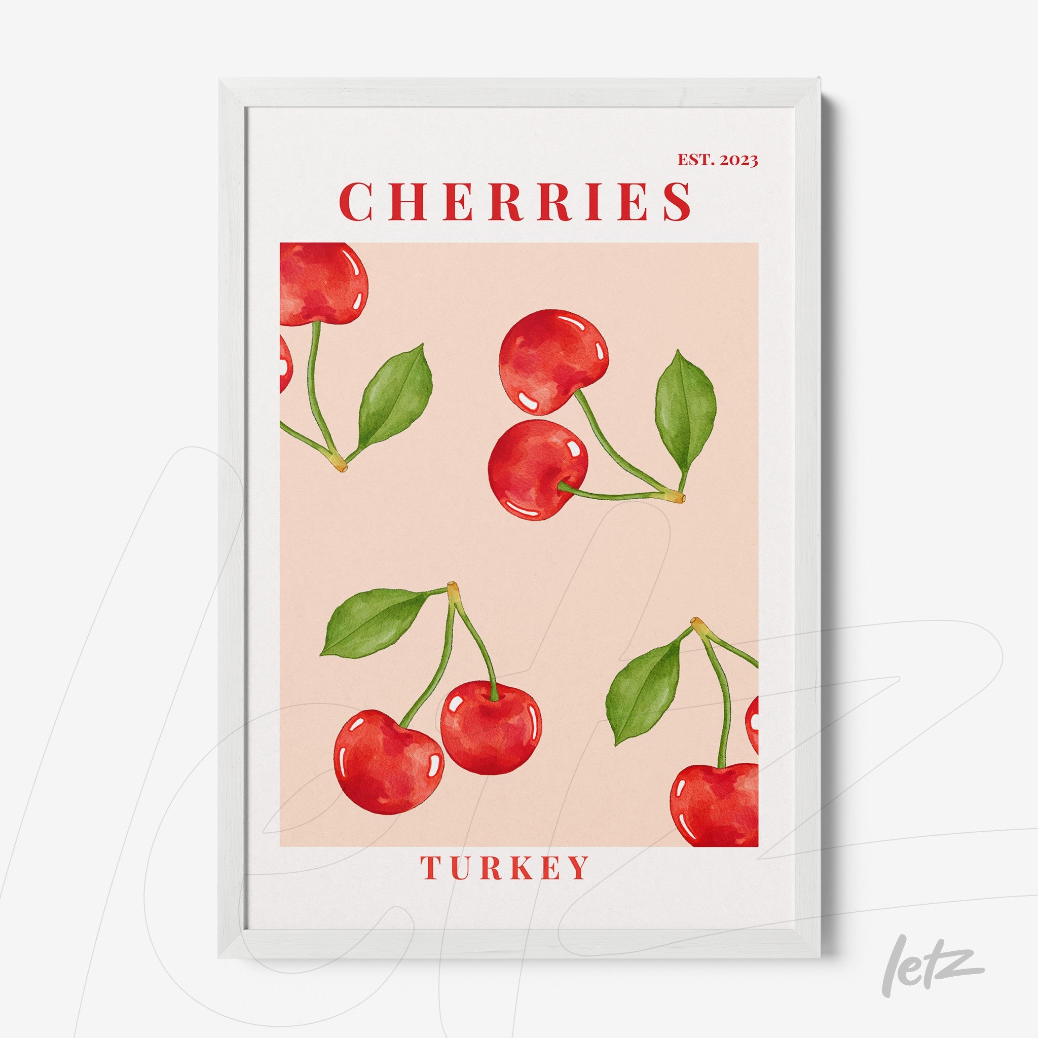 framed wall art featuring red cherries on a pink background with white frame displaying 'Turkey' and 'Cherries' text