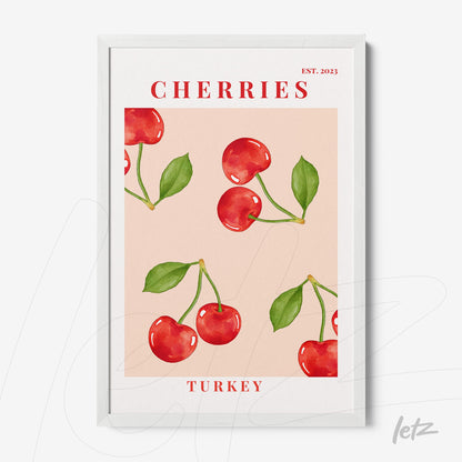framed wall art featuring red cherries on a pink background with white frame displaying 'Turkey' and 'Cherries' text