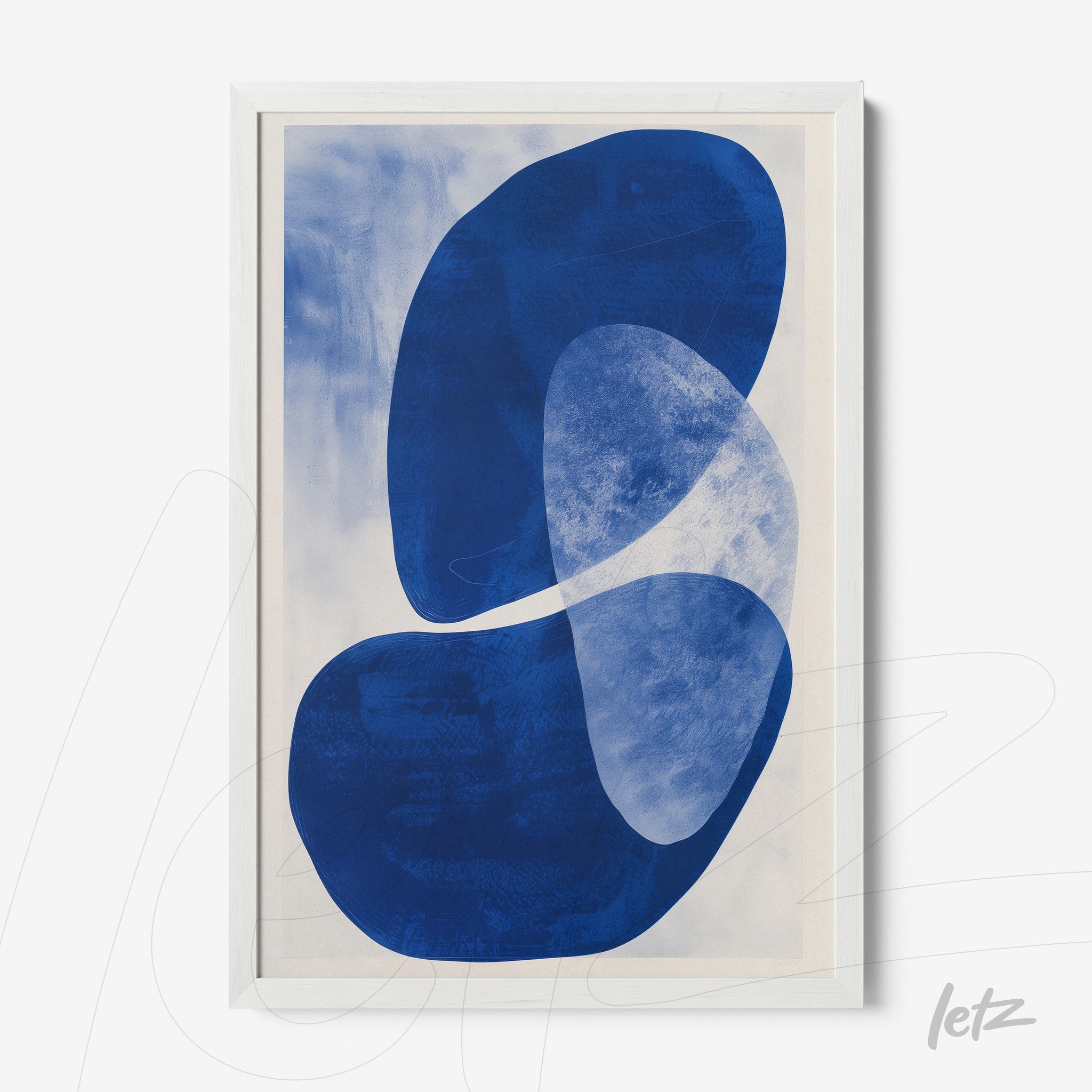 abstract wall art in blue shades framed in white