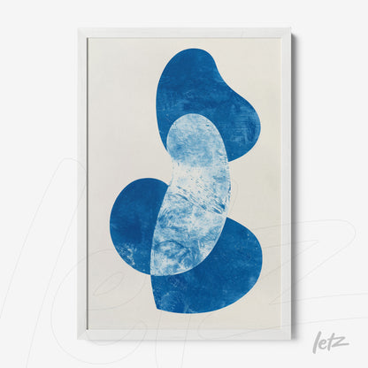 abstract wall art featuring blue shapes on a light background with a white frame