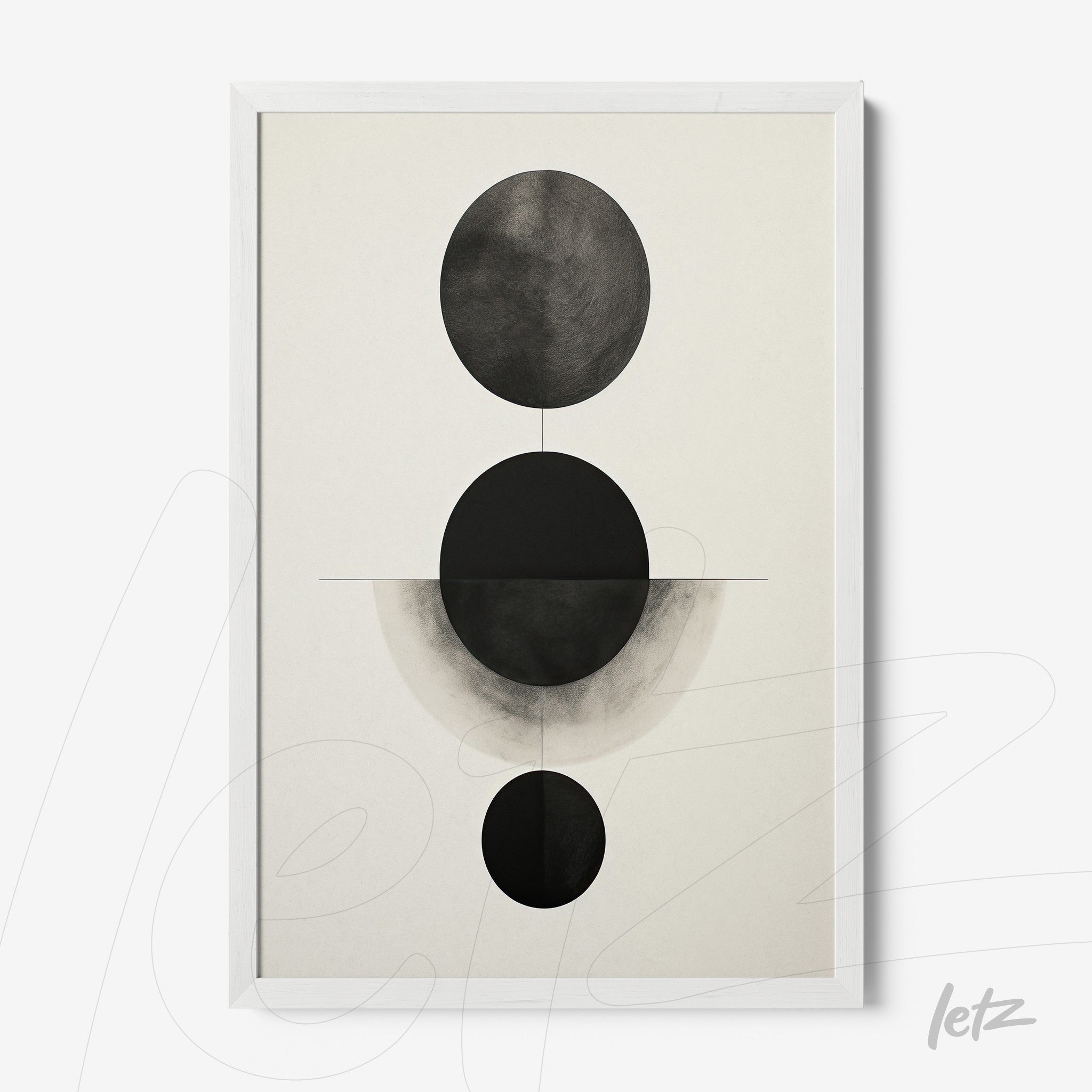 framed abstract art in black and white featuring circular shapes on a light background with a white frame