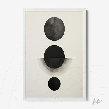 framed abstract art in black and white featuring circular shapes on a light background with a white frame