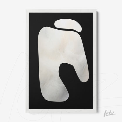abstract wall art on black background featuring a cream-colored organic shape framed with a white frame