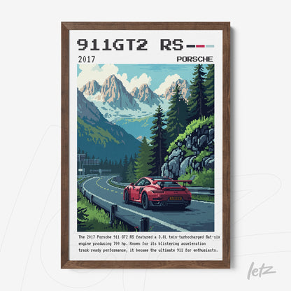 framed wall art featuring a red porsche 911 gt2 rs on a mountainous road surrounded by trees and peaks in the background
