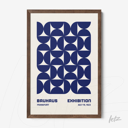framed geometric wall art in blue bauhaus style with dark wooden frame
