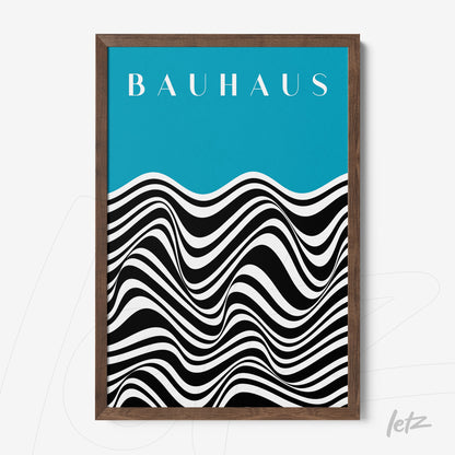 printed poster featuring black and white wave design on blue background, framed in dark wood