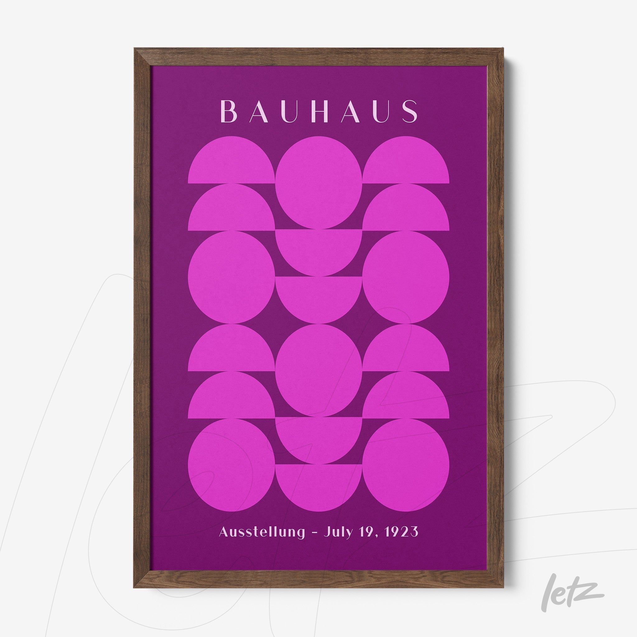 poster print of bauhaus art in purple and pink with dark wooden frame