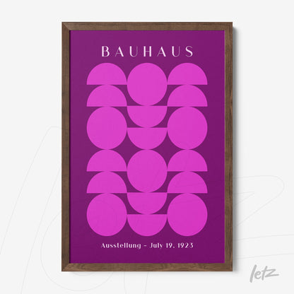 poster print of bauhaus art in purple and pink with dark wooden frame