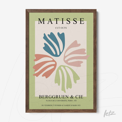 framed modern art inspired by matisse featuring organic shapes in soft colors on a green background with dark wooden frame