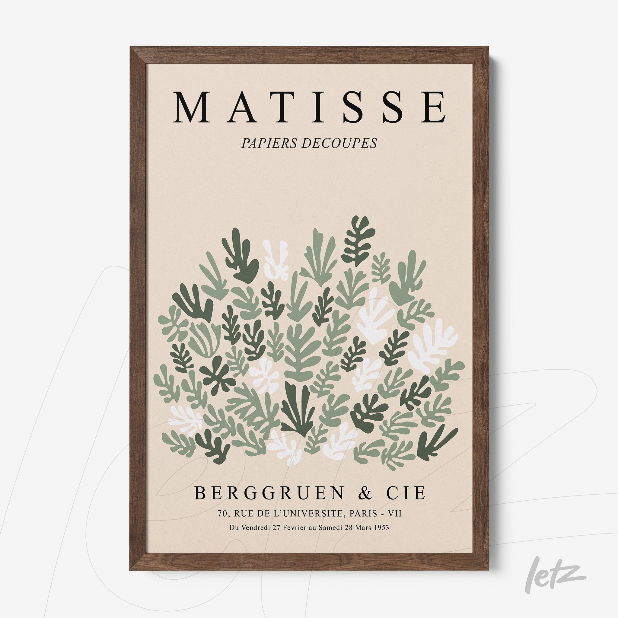 framed wall art featuring modernist style green leaves design with dark wood frame